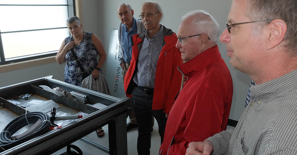 The Corner Brook Rotary Club dropped by for a visit to learn about what CRI has to offer. here, their members check out the plasma cutter. Photo credit: Olaf Janzen
